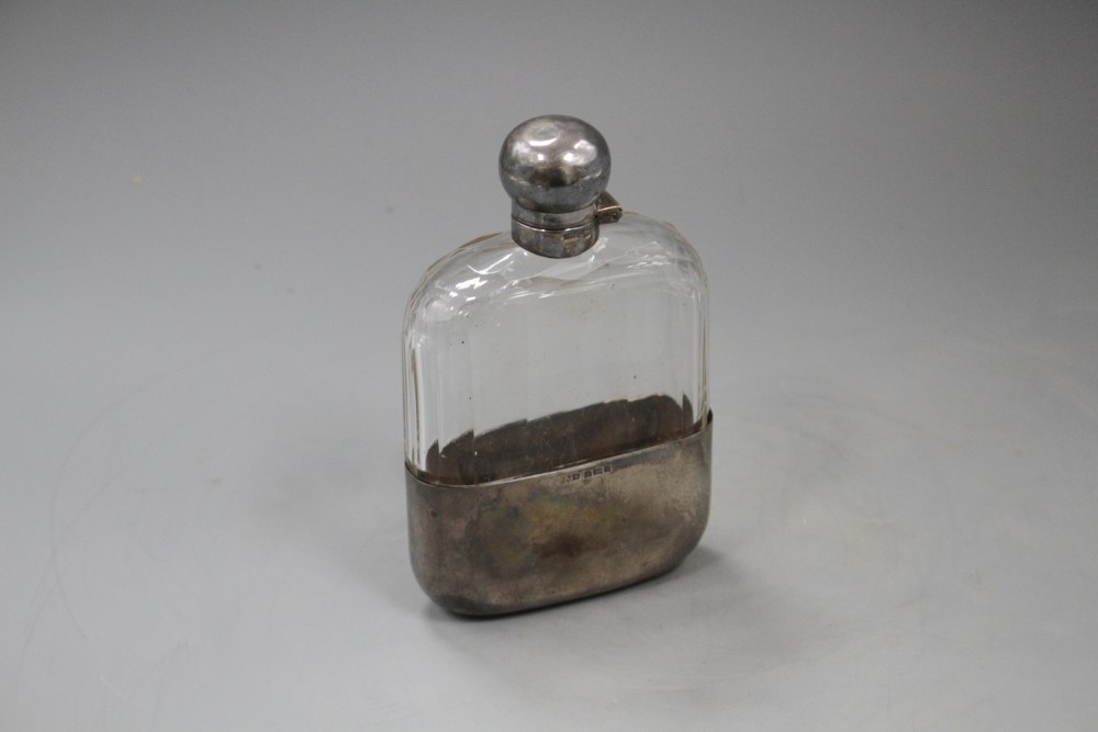 A Victorian silver mounted cut glass hip flask by James Dixon & Sons, Sheffield, 1891, 15.4cm.